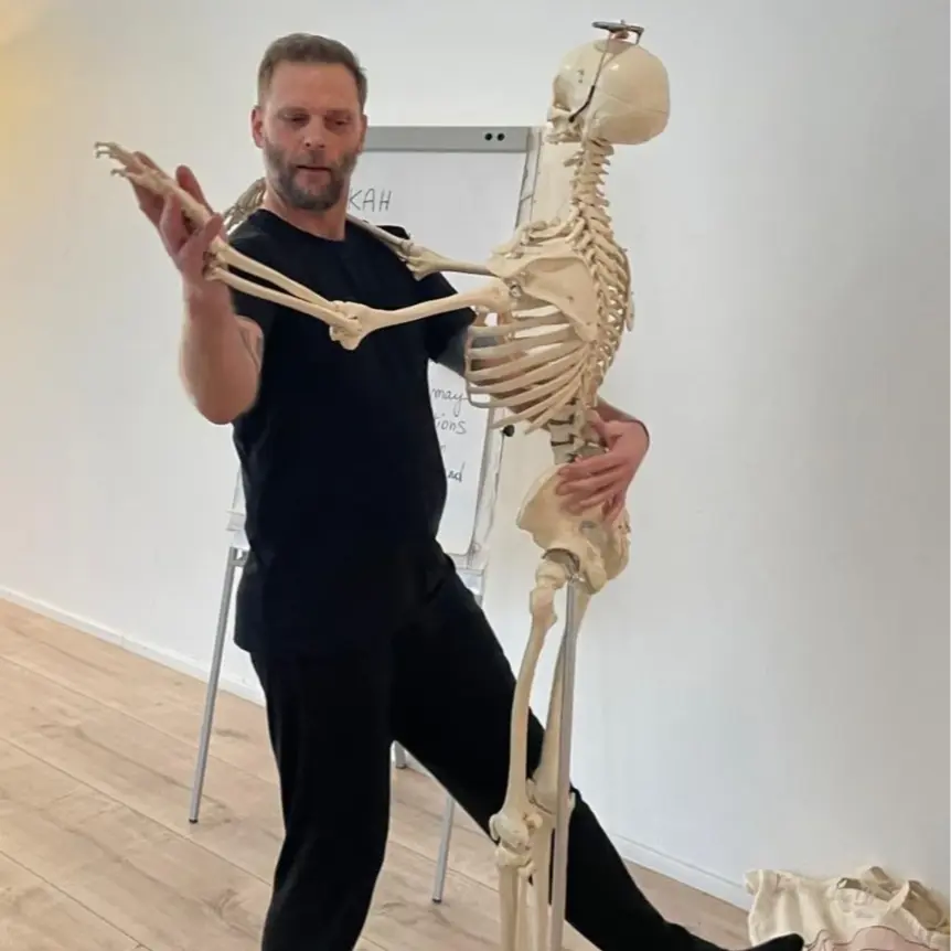 A man dancing with skeleton