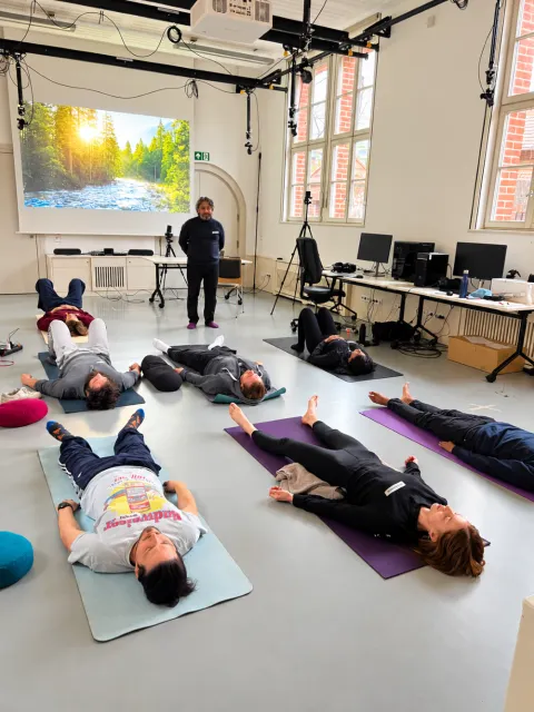 Students performing yoga